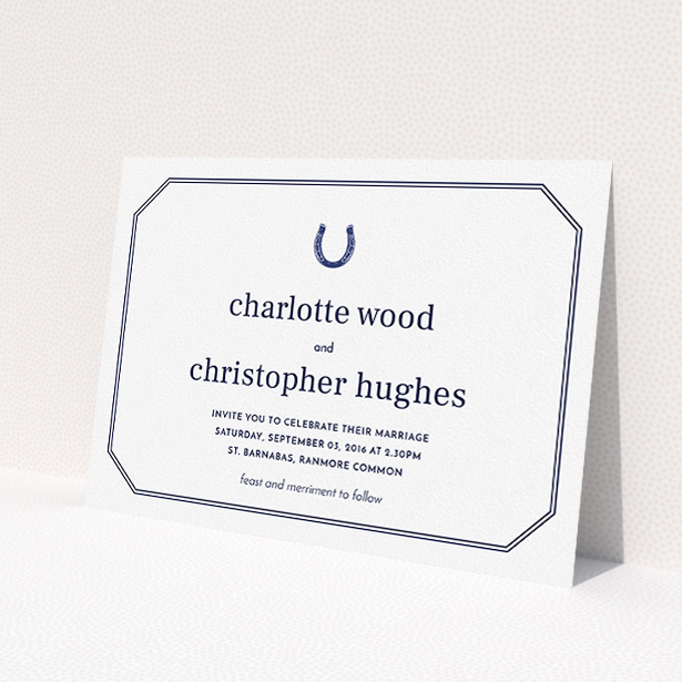 A personalised wedding invite design called "Lucky horse shoe". It is an A5 invite in a landscape orientation. "Lucky horse shoe" is available as a flat invite, with tones of navy blue and white.