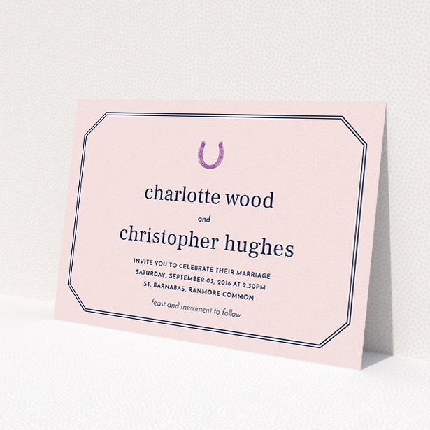 A personalised wedding invite template titled "Lucky horse shoe". It is an A5 invite in a landscape orientation. "Lucky horse shoe" is available as a flat invite, with mainly pink colouring.