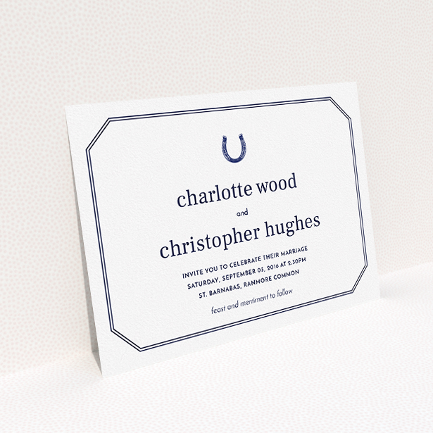 A personalised wedding invite design called "Lucky horse shoe". It is an A5 invite in a landscape orientation. "Lucky horse shoe" is available as a flat invite, with tones of navy blue and white.