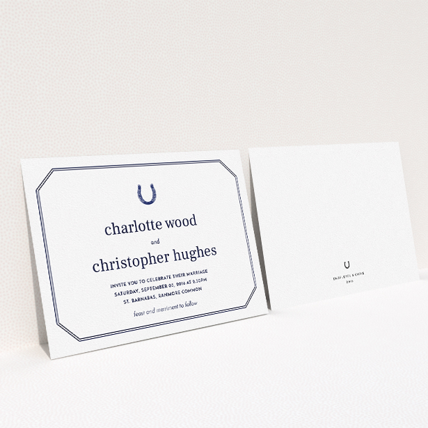 A personalised wedding invite design called "Lucky horse shoe". It is an A5 invite in a landscape orientation. "Lucky horse shoe" is available as a flat invite, with tones of navy blue and white.