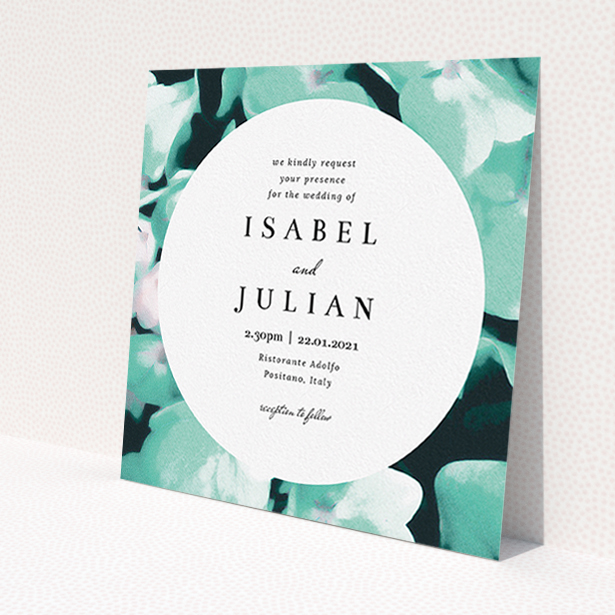 A personalised wedding invite design titled "Mint Night Garden". It is a square (148mm x 148mm) invite in a square orientation. "Mint Night Garden" is available as a flat invite, with tones of green, blue and midnight green.