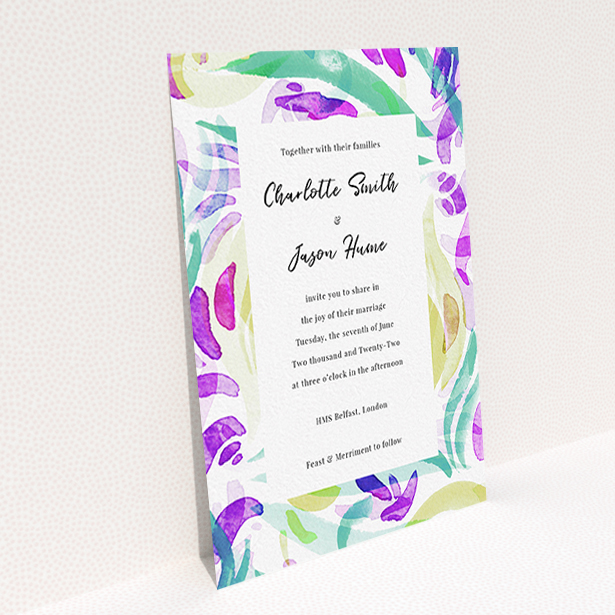 A personalised wedding invite called "Neon Florals". It is an A6 invite in a portrait orientation. "Neon Florals" is available as a flat invite, with tones of white and green.