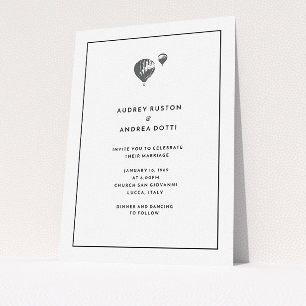A personalised wedding invite design titled "Off and away". It is an A5 invite in a portrait orientation. "Off and away" is available as a flat invite, with tones of white and grey.