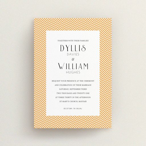 A personalised wedding invite called "Orange Houndstooth". It is an A6 invite in a portrait orientation. "Orange Houndstooth" is available as a flat invite, with tones of orange and white.