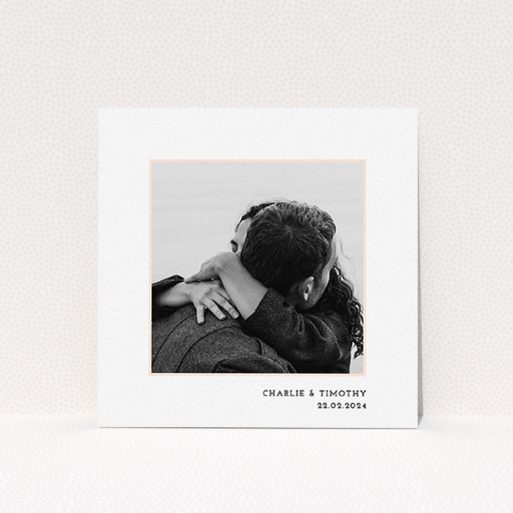 A personalised wedding invite called "Photo Centre". It is a square (148mm x 148mm) invite in a square orientation. It is a photographic personalised wedding invite with room for 1 photo. "Photo Centre" is available as a flat invite, with tones of white and pink.