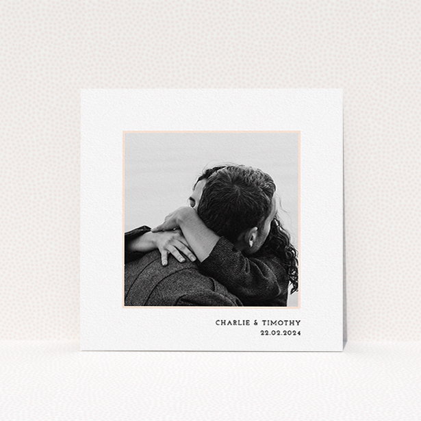 A personalised wedding invite called "Photo Centre". It is a square (148mm x 148mm) invite in a square orientation. It is a photographic personalised wedding invite with room for 1 photo. "Photo Centre" is available as a flat invite, with tones of white and pink.