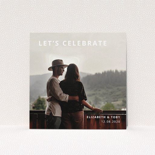 A personalised wedding invite design called "Sans Serif". It is a square (148mm x 148mm) invite in a square orientation. It is a photographic personalised wedding invite with room for 1 photo. "Sans Serif" is available as a flat invite, with mainly white colouring.