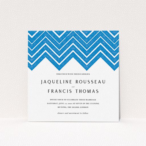 A personalised wedding invite design titled "Skiapthos". It is a square (148mm x 148mm) invite in a square orientation. "Skiapthos" is available as a flat invite, with tones of blue and white.