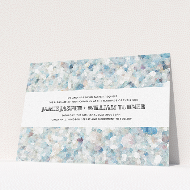 A personalised wedding invite named "Speckled Oils". It is an A5 invite in a landscape orientation. "Speckled Oils" is available as a flat invite, with tones of light blue, light grey and white.