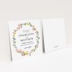A personalised wedding invite template titled "Spring Wreath". It is a square (148mm x 148mm) invite in a square orientation. "Spring Wreath" is available as a flat invite, with mainly pink colouring.