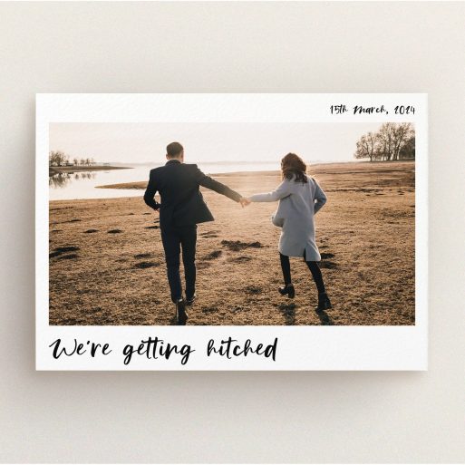 A personalised wedding invite design called "Top and Bottom Photo". It is an A5 invite in a landscape orientation. It is a photographic personalised wedding invite with room for 1 photo. "Top and Bottom Photo" is available as a flat invite, with mainly white colouring.