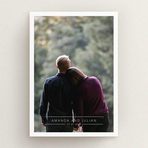 A personalised wedding invite template titled "Tramlines". It is an A5 invite in a portrait orientation. It is a photographic personalised wedding invite with room for 1 photo. "Tramlines" is available as a flat invite, with mainly white colouring.