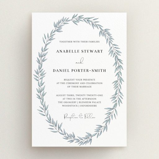A personalised wedding invite named "Tussled Wreath". It is an A5 invite in a portrait orientation. "Tussled Wreath" is available as a flat invite, with tones of blue and white.