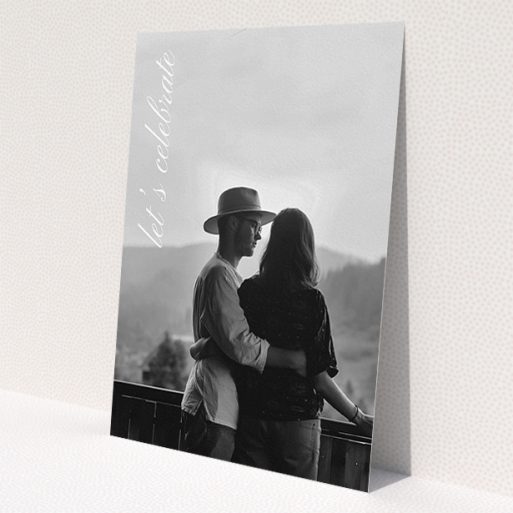A personalised wedding invite design named 'Up the side'. It is an A5 invite in a portrait orientation. It is a photographic personalised wedding invite with room for 1 photo. 'Up the side' is available as a flat invite, with mainly white colouring.
