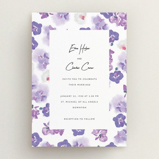 A personalised wedding invite template titled "Violet Explosion". It is an A5 invite in a portrait orientation. "Violet Explosion" is available as a flat invite, with tones of white, purple and violet.