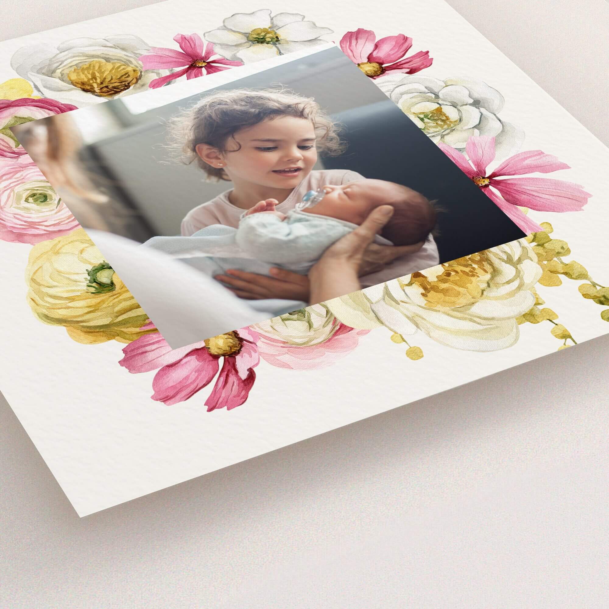 Floral birth announcement card design with one photo of siblings.