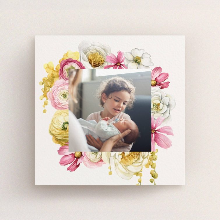 Floral birth announcement card design with one photo of siblings.