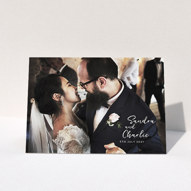 A photo wedding thank you card design called "1 Photo Full". It is an A5 card in a landscape orientation. It is a photographic photo wedding thank you card with room for 1 photo. "1 Photo Full" is available as a folded card, with mainly white colouring.
