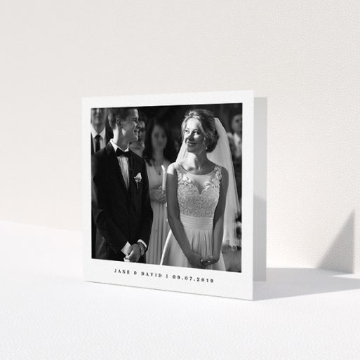 A photo wedding thank you card called 'Big centre'. It is a square (148mm x 148mm) card in a square orientation. It is a photographic photo wedding thank you card with room for 1 photo. 'Big centre' is available as a folded card, with mainly white colouring.