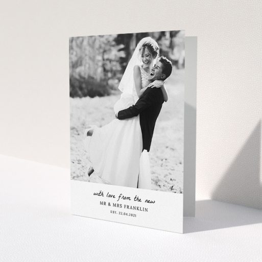 A photo wedding thank you card design named 'Black and White Thanks'. It is an A5 card in a portrait orientation. It is a photographic photo wedding thank you card with room for 1 photo. 'Black and White Thanks' is available as a folded card, with mainly white colouring.