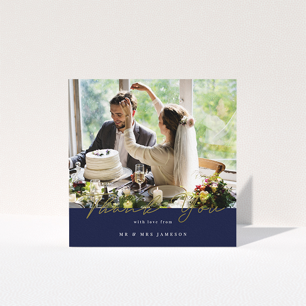 A photo wedding thank you card called "Blue and Gold". It is a square (148mm x 148mm) card in a square orientation. It is a photographic photo wedding thank you card with room for 1 photo. "Blue and Gold" is available as a folded card, with tones of navy blue and white.