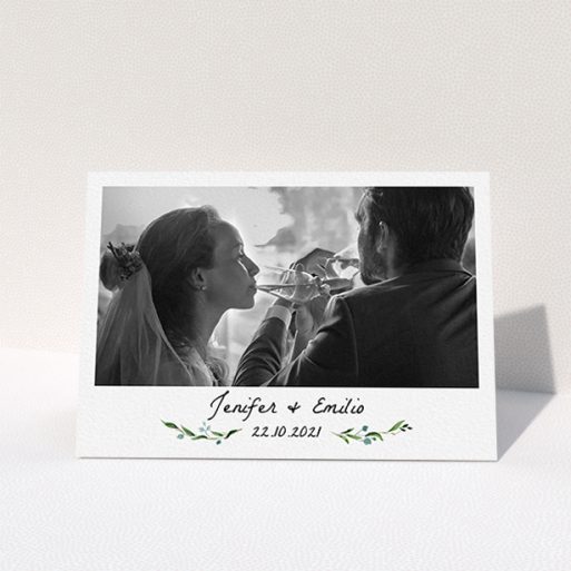 A photo wedding thank you card called "Classic Floral". It is an A6 card in a landscape orientation. It is a photographic photo wedding thank you card with room for 1 photo. "Classic Floral" is available as a folded card, with tones of green and white.