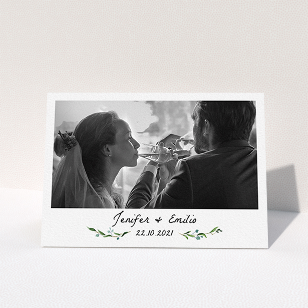 A photo wedding thank you card called "Classic Floral". It is an A6 card in a landscape orientation. It is a photographic photo wedding thank you card with room for 1 photo. "Classic Floral" is available as a folded card, with tones of green and white.
