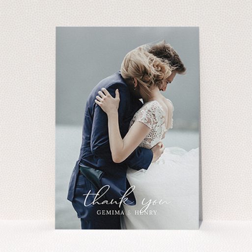 A photo wedding thank you card called "Classic Thank You". It is an A6 card in a portrait orientation. It is a photographic photo wedding thank you card with room for 1 photo. "Classic Thank You" is available as a flat card, with mainly white colouring.