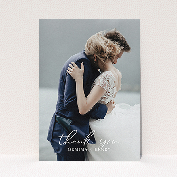 A photo wedding thank you card called "Classic Thank You". It is an A6 card in a portrait orientation. It is a photographic photo wedding thank you card with room for 1 photo. "Classic Thank You" is available as a flat card, with mainly white colouring.