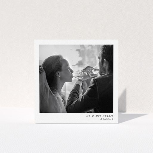 A photo wedding thank you card design named "Clean and simple". It is a square (148mm x 148mm) card in a square orientation. It is a photographic photo wedding thank you card with room for 1 photo. "Clean and simple" is available as a folded card, with mainly white colouring.