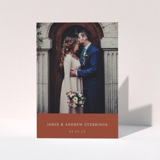 A photo wedding thank you card design called "Dark Ochre Footer". It is an A5 card in a portrait orientation. It is a photographic photo wedding thank you card with room for 1 photo. "Dark Ochre Footer" is available as a folded card, with mainly dark orange colouring.