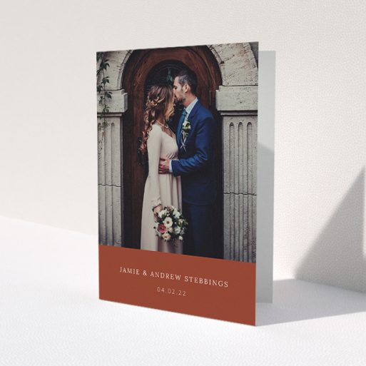 A photo wedding thank you card design called 'Dark Ochre Footer'. It is an A5 card in a portrait orientation. It is a photographic photo wedding thank you card with room for 1 photo. 'Dark Ochre Footer' is available as a folded card, with mainly dark orange colouring.