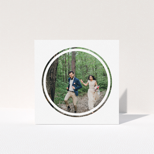 A photo wedding thank you card named "Double circle". It is a square (148mm x 148mm) card in a square orientation. It is a photographic photo wedding thank you card with room for 1 photo. "Double circle" is available as a folded card, with mainly white colouring.