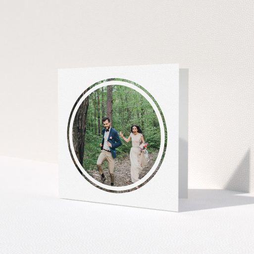 A photo wedding thank you card named 'Double circle'. It is a square (148mm x 148mm) card in a square orientation. It is a photographic photo wedding thank you card with room for 1 photo. 'Double circle' is available as a folded card, with mainly white colouring.