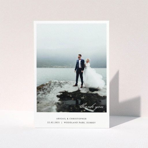 A photo wedding thank you card template titled "Elegant Photo Card". It is an A5 card in a portrait orientation. It is a photographic photo wedding thank you card with room for 1 photo. "Elegant Photo Card" is available as a folded card, with mainly white colouring.