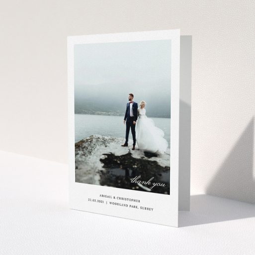 A photo wedding thank you card template titled 'Elegant Photo Card'. It is an A5 card in a portrait orientation. It is a photographic photo wedding thank you card with room for 1 photo. 'Elegant Photo Card' is available as a folded card, with mainly white colouring.