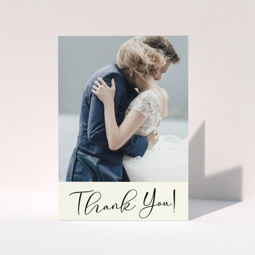 A photo wedding thank you card template titled "Gold Stripe Thank You". It is an A6 card in a portrait orientation. It is a photographic photo wedding thank you card with room for 1 photo. "Gold Stripe Thank You" is available as a folded card, with mainly cream colouring.