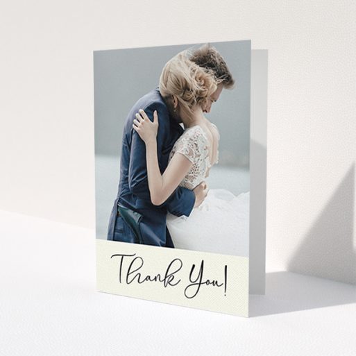 A photo wedding thank you card template titled 'Gold Stripe Thank You'. It is an A6 card in a portrait orientation. It is a photographic photo wedding thank you card with room for 1 photo. 'Gold Stripe Thank You' is available as a folded card, with mainly cream colouring.