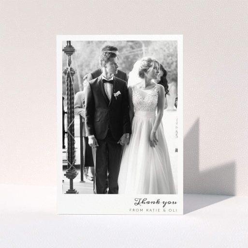 A photo wedding thank you card design titled "Handwritten script". It is an A5 card in a portrait orientation. It is a photographic photo wedding thank you card with room for 1 photo. "Handwritten script" is available as a folded card, with mainly white colouring.