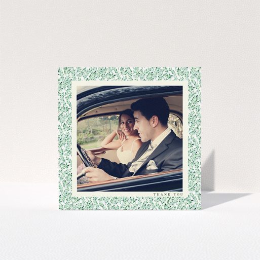 A photo wedding thank you card called "Hedge border". It is a square (148mm x 148mm) card in a square orientation. It is a photographic photo wedding thank you card with room for 1 photo. "Hedge border" is available as a folded card, with tones of green and white.