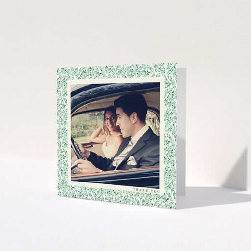 A photo wedding thank you card called 'Hedge border'. It is a square (148mm x 148mm) card in a square orientation. It is a photographic photo wedding thank you card with room for 1 photo. 'Hedge border' is available as a folded card, with tones of green and white.