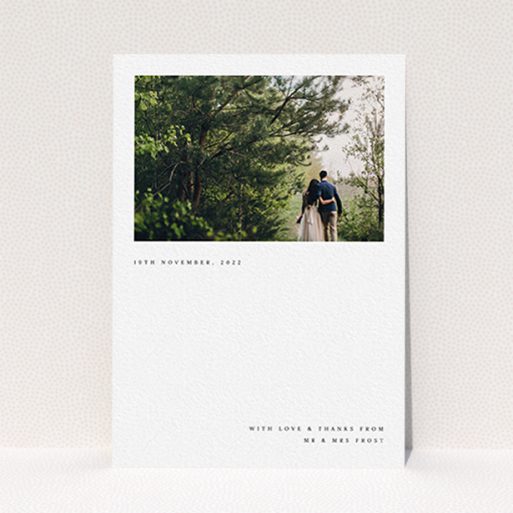 A photo wedding thank you card design called "Modern Postcard". It is an A6 card in a portrait orientation. It is a photographic photo wedding thank you card with room for 1 photo. "Modern Postcard" is available as a flat card, with mainly white colouring.