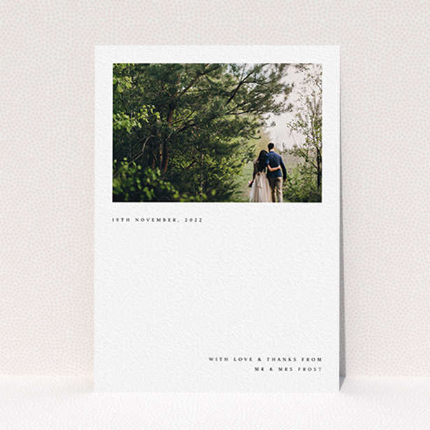 A photo wedding thank you card design called "Modern Postcard". It is an A6 card in a portrait orientation. It is a photographic photo wedding thank you card with room for 1 photo. "Modern Postcard" is available as a flat card, with mainly white colouring.