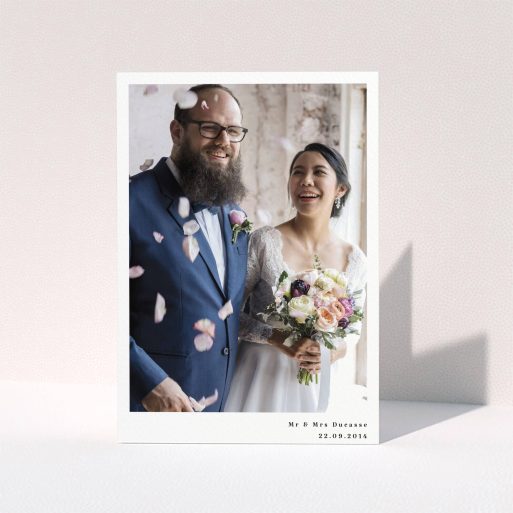 Photo Wedding Thank You Card Design - "Most of the page" A photo wedding thank you card called "Most of the page". It is an A5 card in a portrait orientation. It is a photographic photo wedding thank you card with room for 1 photo. "Most of the page" is available as a folded card, with mainly white colouring.