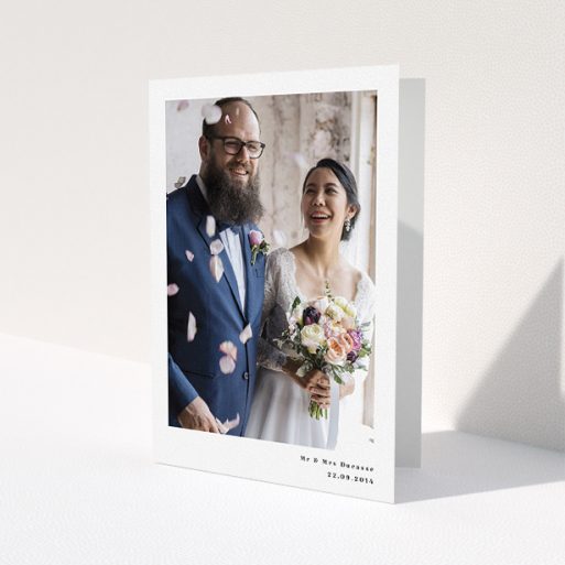 A photo wedding thank you card called 'Most of the page'. It is an A5 card in a portrait orientation. It is a photographic photo wedding thank you card with room for 1 photo. 'Most of the page' is available as a folded card, with mainly white colouring.