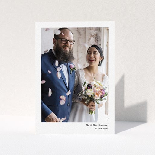 A photo wedding thank you card template titled "Most of the page". It is an A6 card in a portrait orientation. It is a photographic photo wedding thank you card with room for 1 photo. "Most of the page" is available as a folded card, with mainly white colouring.