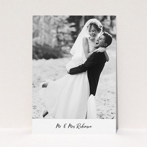 A photo wedding thank you card design named "Mr & Mrs Footer". It is an A6 card in a portrait orientation. It is a photographic photo wedding thank you card with room for 1 photo. "Mr & Mrs Footer" is available as a flat card, with mainly white colouring.