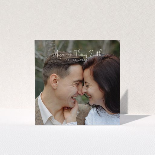 A photo wedding thank you card named "Name-Date-Photo". It is a square (148mm x 148mm) card in a square orientation. It is a photographic photo wedding thank you card with room for 1 photo. "Name-Date-Photo" is available as a folded card, with mainly white colouring.