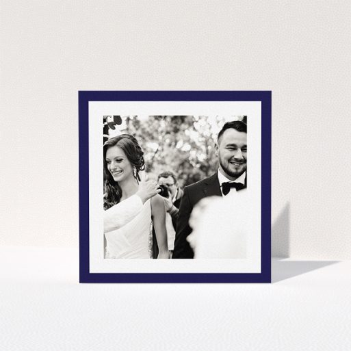 A photo wedding thank you card design named "Navy Border". It is a square (148mm x 148mm) card in a square orientation. It is a photographic photo wedding thank you card with room for 1 photo. "Navy Border" is available as a folded card, with tones of blue and white.
