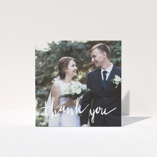 A photo wedding thank you card design called "New to calligraphy". It is a square (148mm x 148mm) card in a square orientation. It is a photographic photo wedding thank you card with room for 1 photo. "New to calligraphy" is available as a folded card, with mainly white colouring.